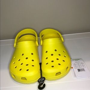 Brand New Crocs classic Clogs. original bag/tags. Women size  8 - Men (kids) 6.